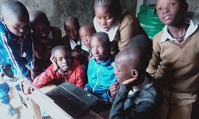 african kids coding during a lesson